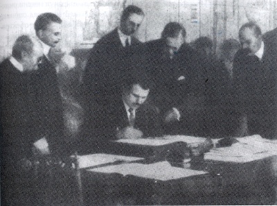 Aleksandar Stamboliyski signing the Treaty of Neuilly on 27 November 1919