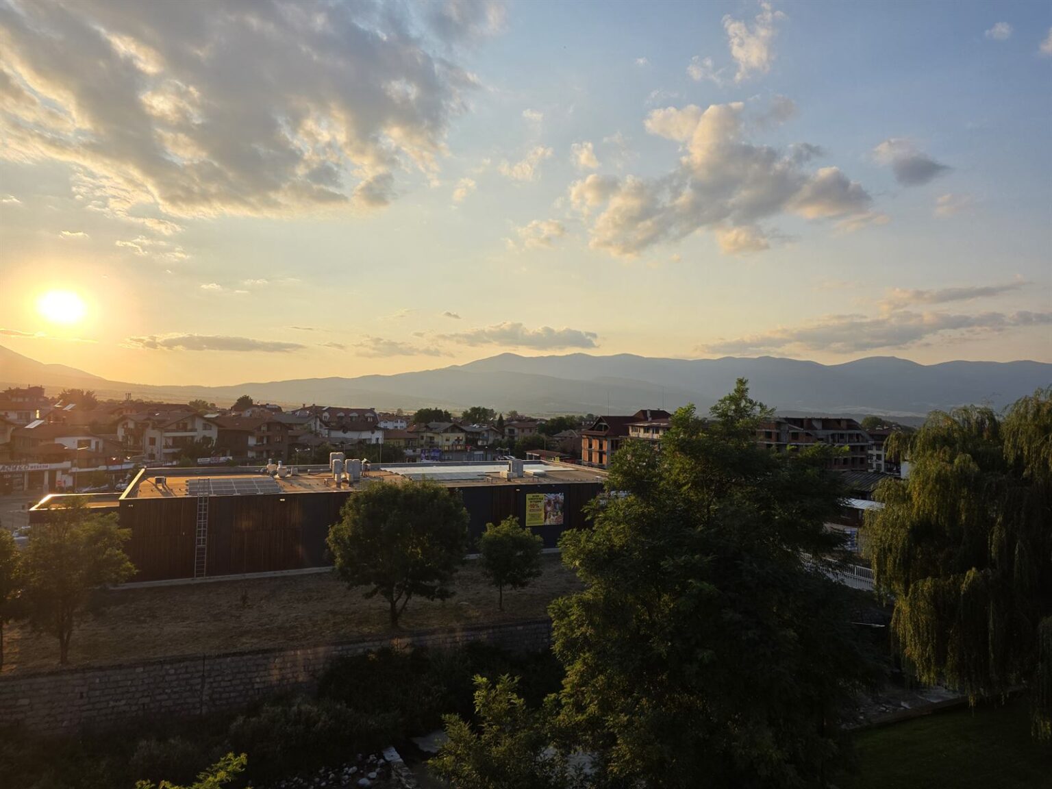 Bansko town and Pirin Mountains at sunset