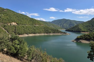 Panoramic summer view of Vacha Reservoir and the Rhodopes