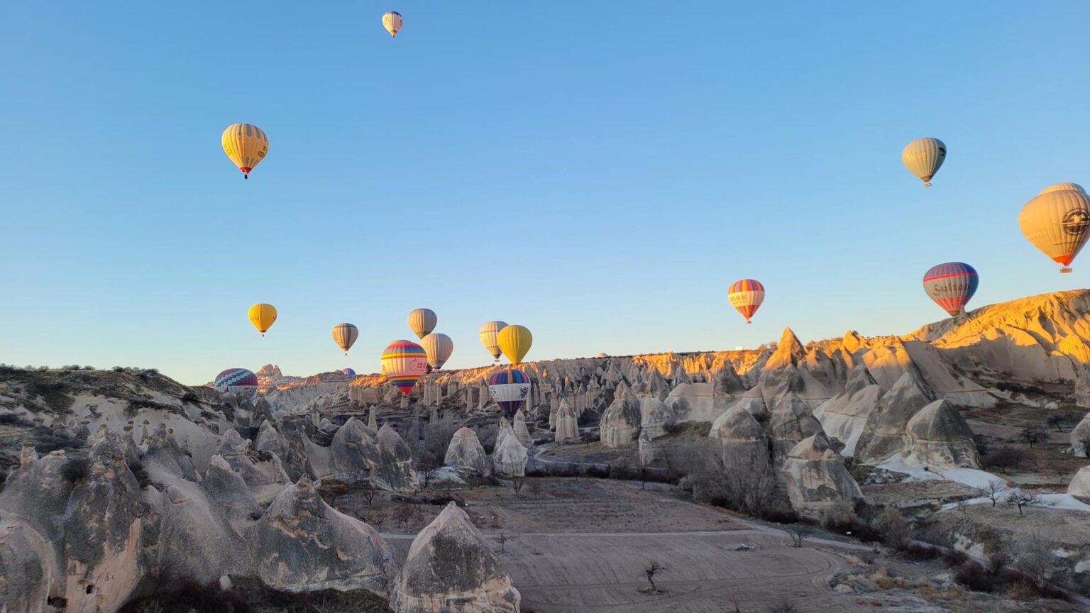 Balloons over Cappadocia at sunrise — 25