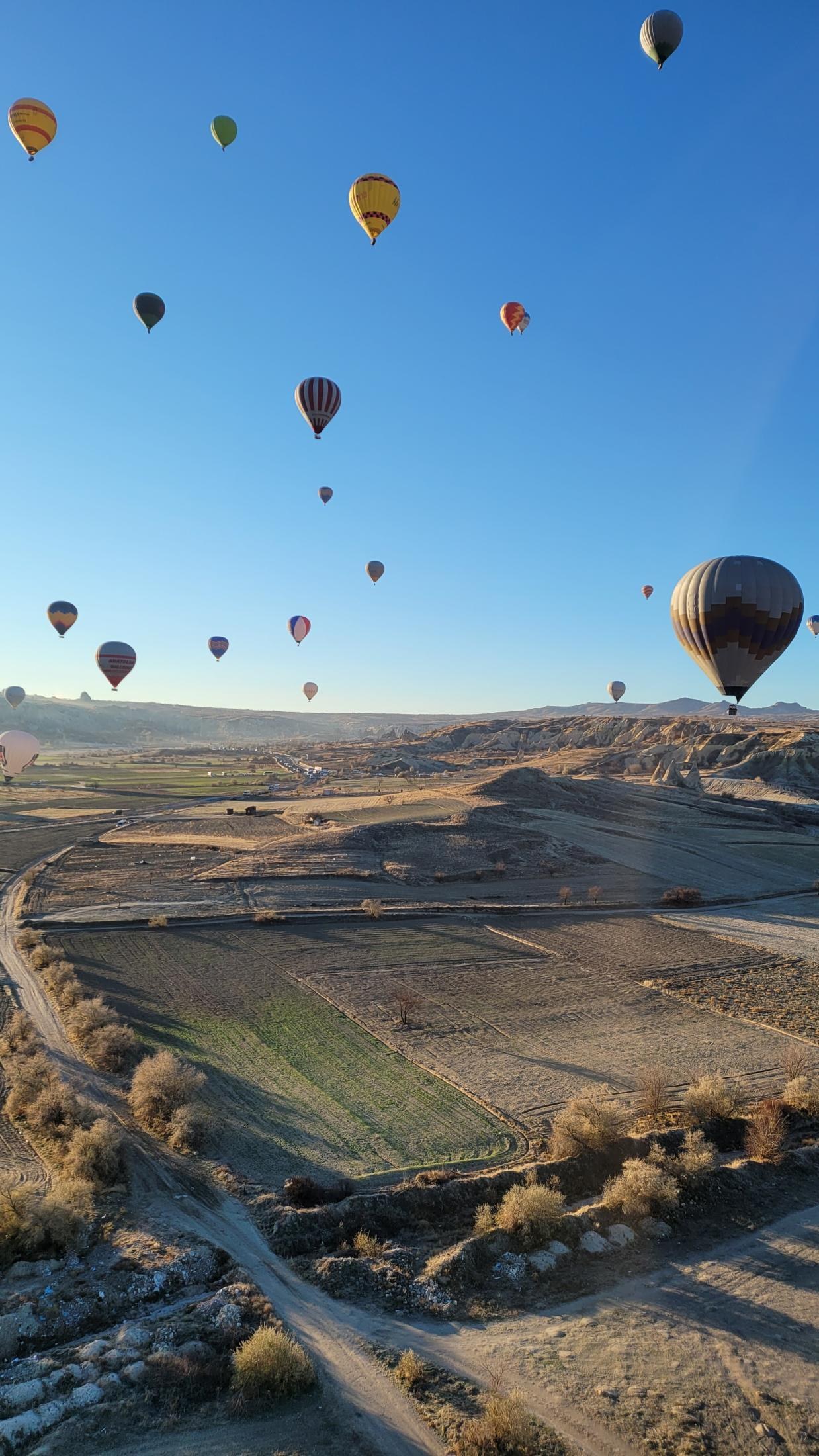 Balloons over Cappadocia at sunrise — 29
