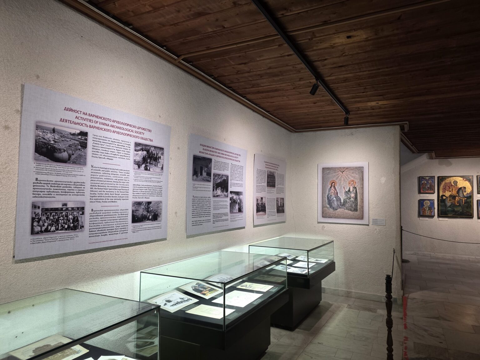Hall with showcases and paintings in the monastery exhibition