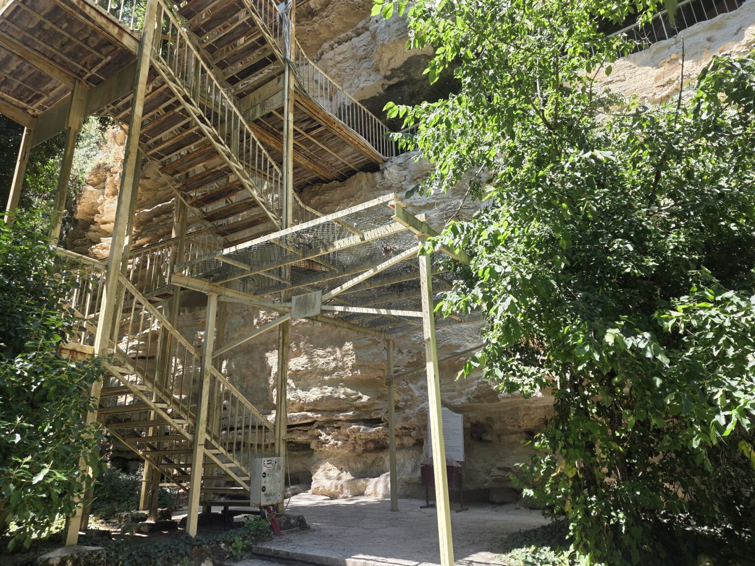 Metal stairs leading to the rock niches of Aladzha monastery