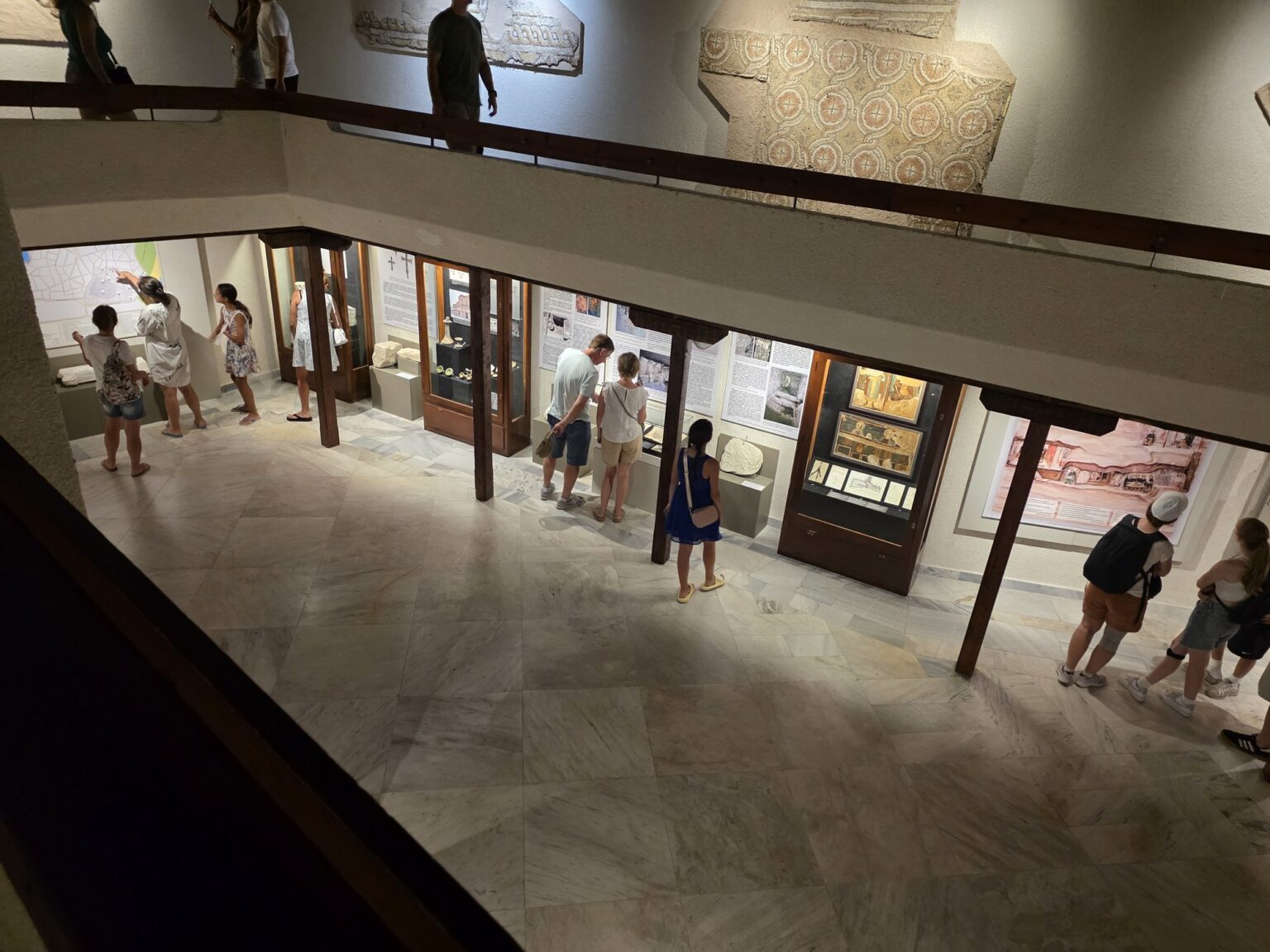 Visitors in the two-story museum hall from above