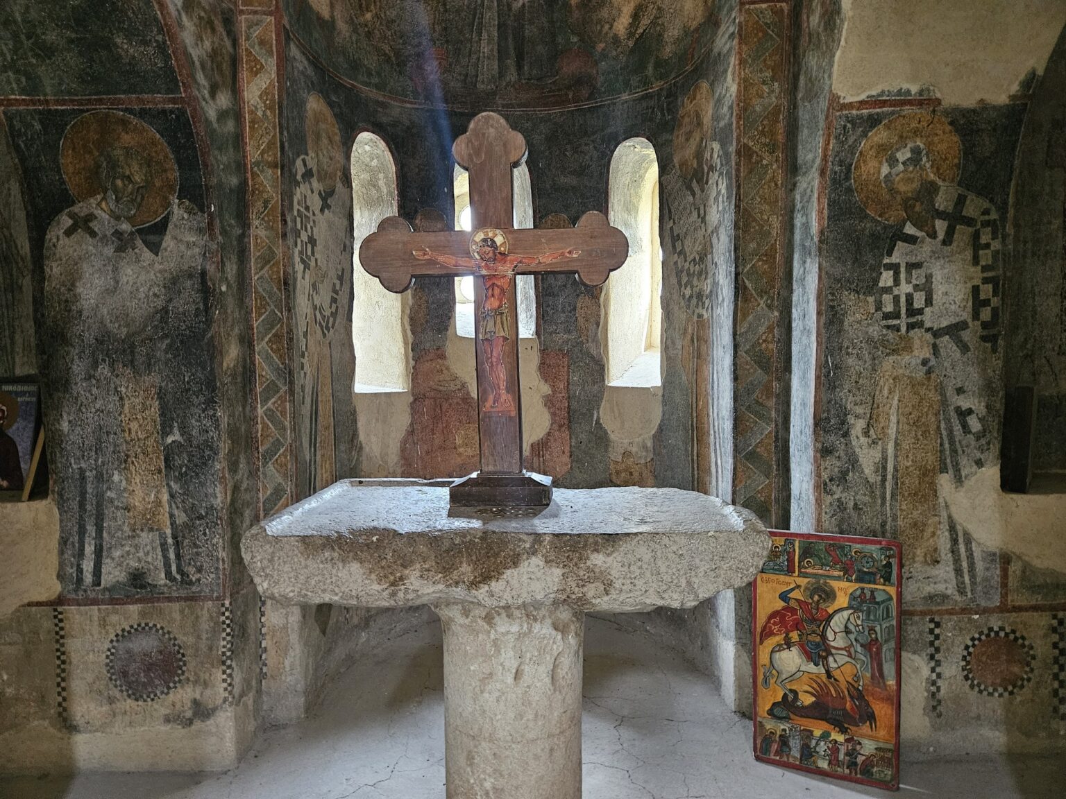 Altar cross and frescoes in the church of Asen's Fortress