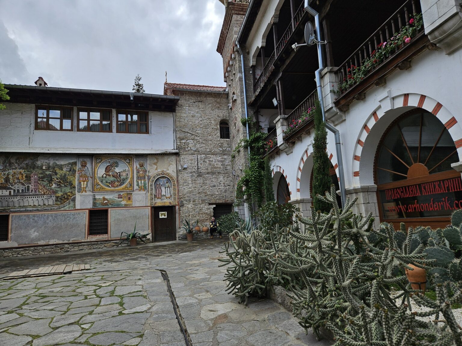 Courtyard with arches and murals in the Bachkovo monastery
