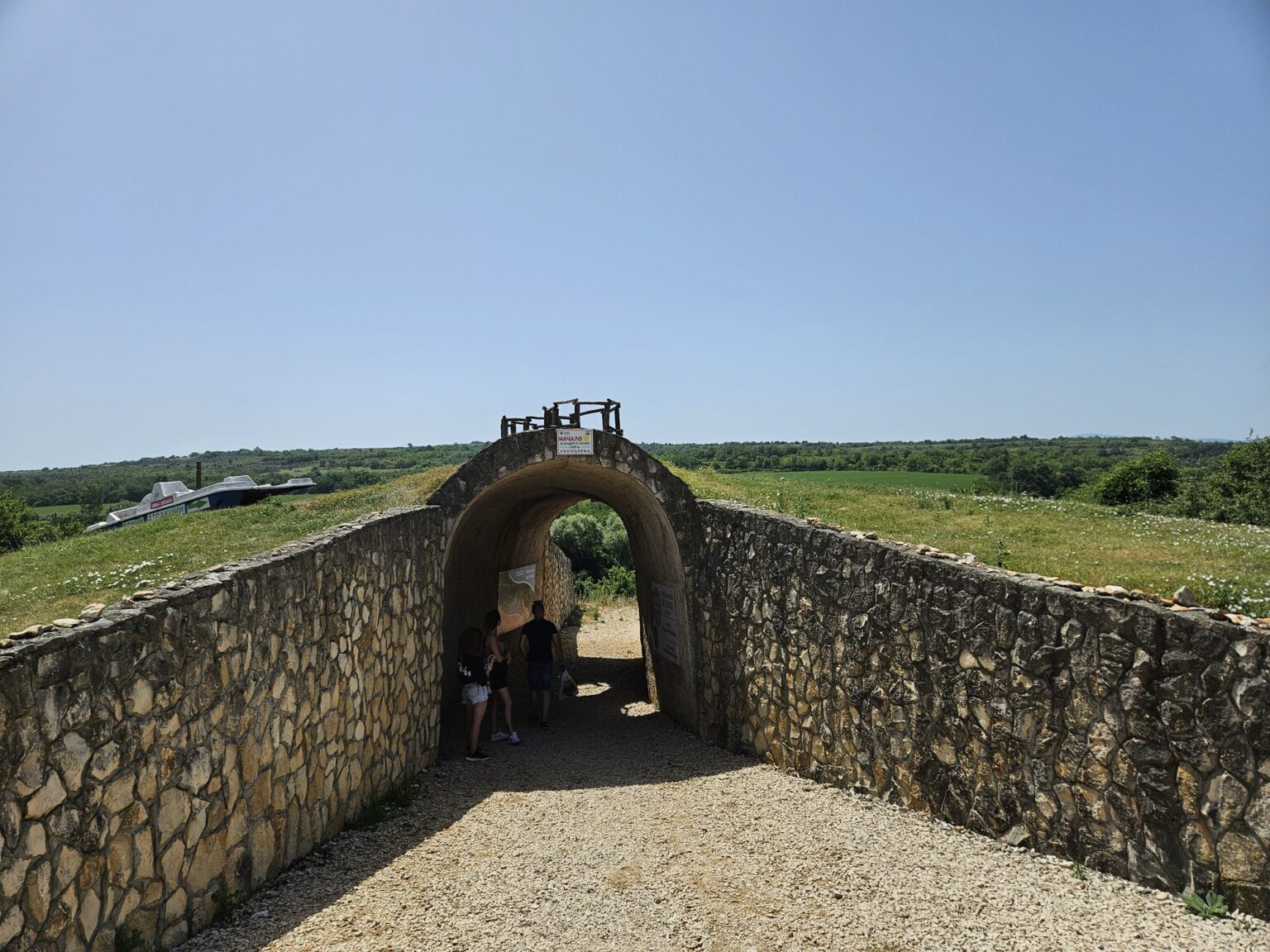Stone bridge over the river with an arch