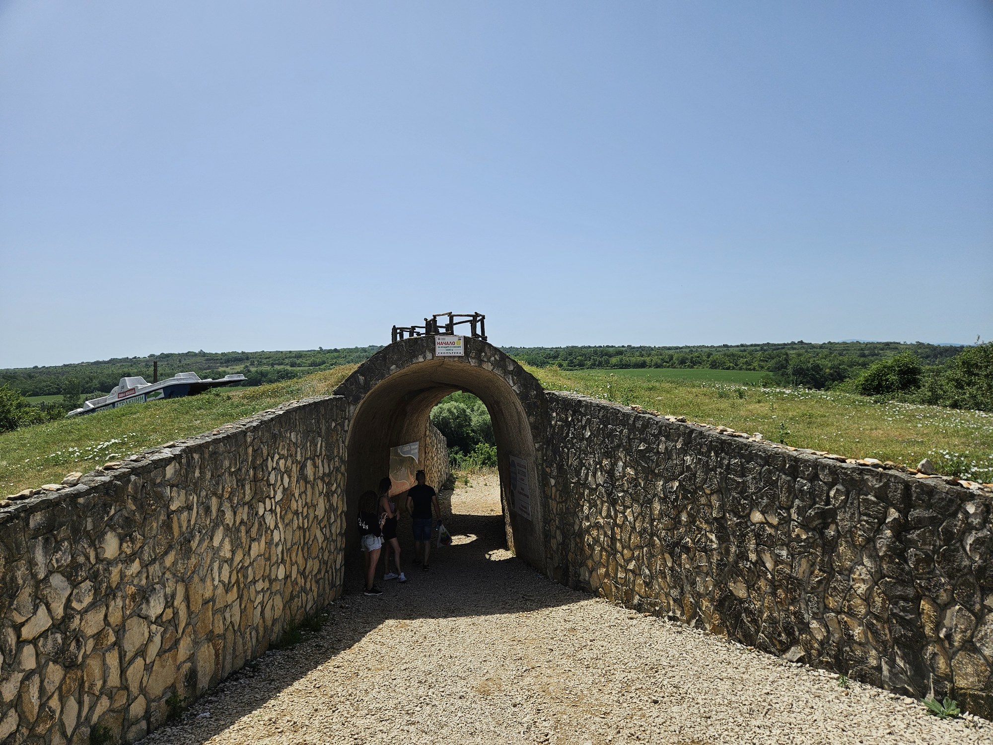 Stone bridge over the river with an arch