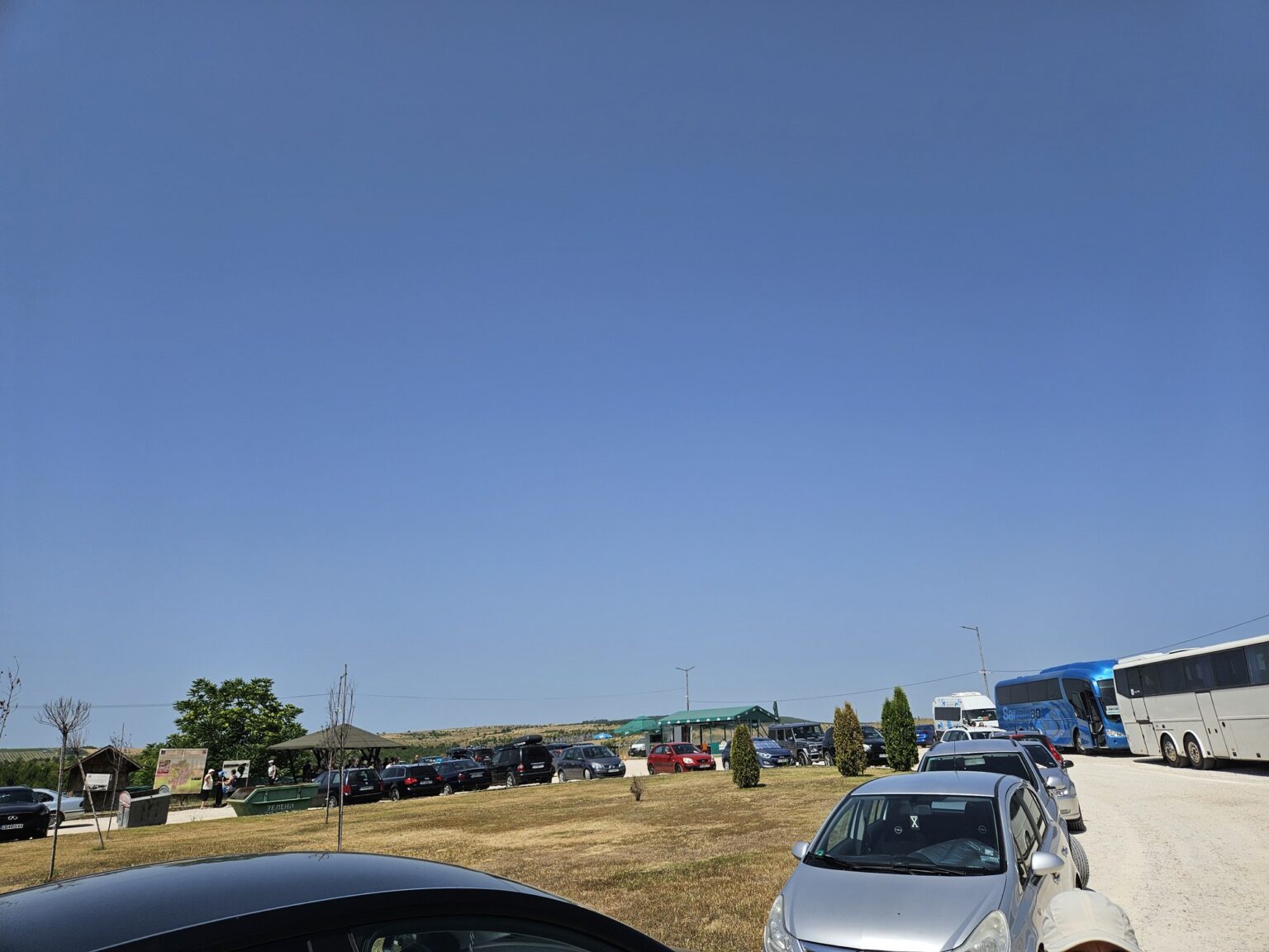 Parked cars and buses near Iskar-Panega eco trail