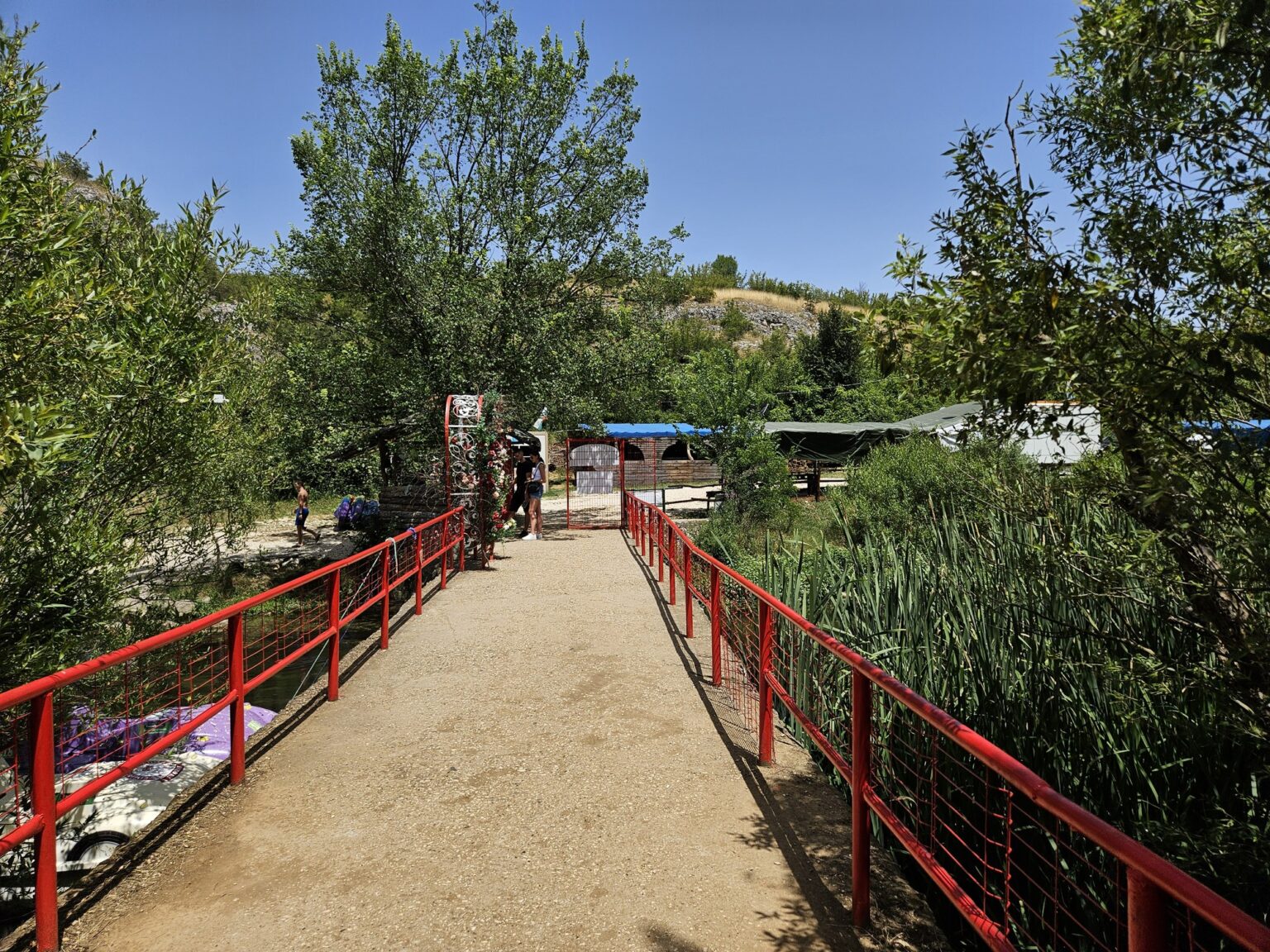 Red bridge over the river along Iskar-Panega eco trail