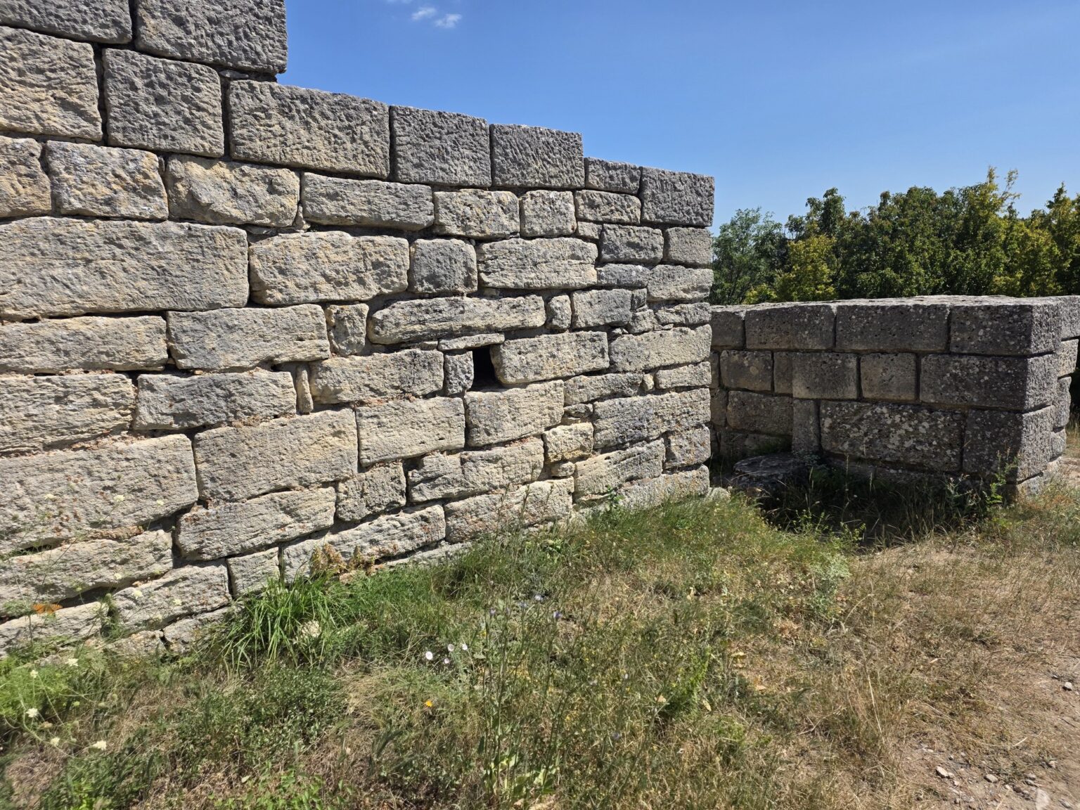 Massive stone blocks of a fortress wall at Madara Rider