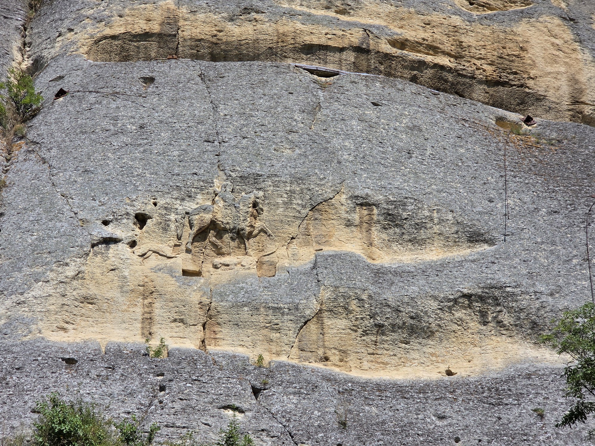 The rock relief of Madara Rider on a vertical cliff
