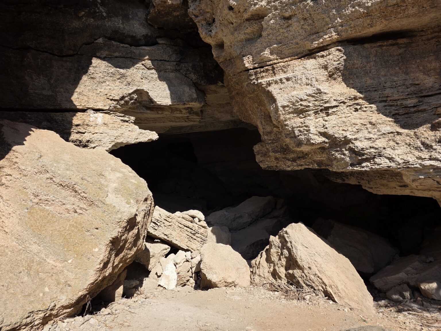 Natural rock niche and large stone blocks